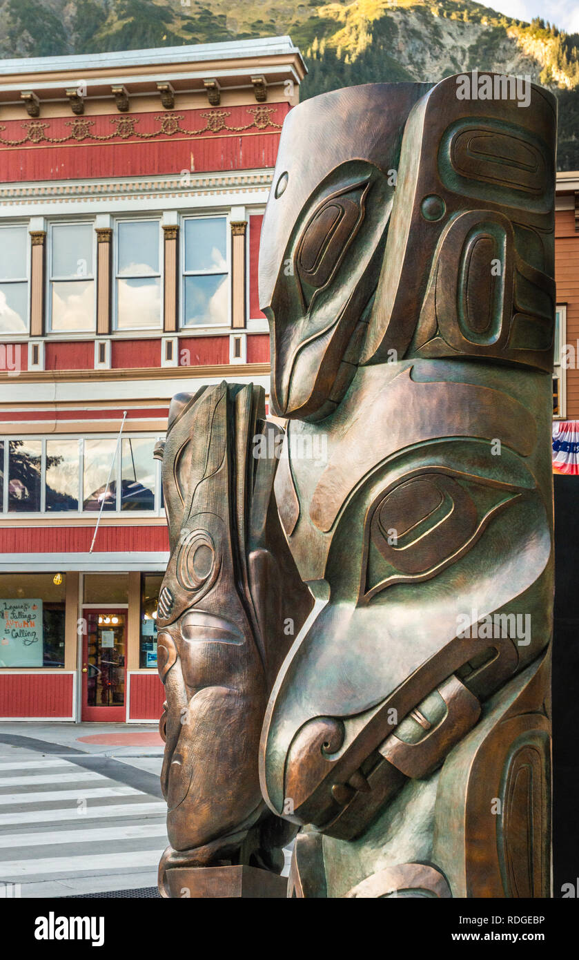 Bronze sculptures by Alaskan Native artists TJ Young (Haida) 'Wasgo' aka a seawolf and of a woman and raven by Stephen Jackson (Tlingit). Juneau, USA. Stock Photo