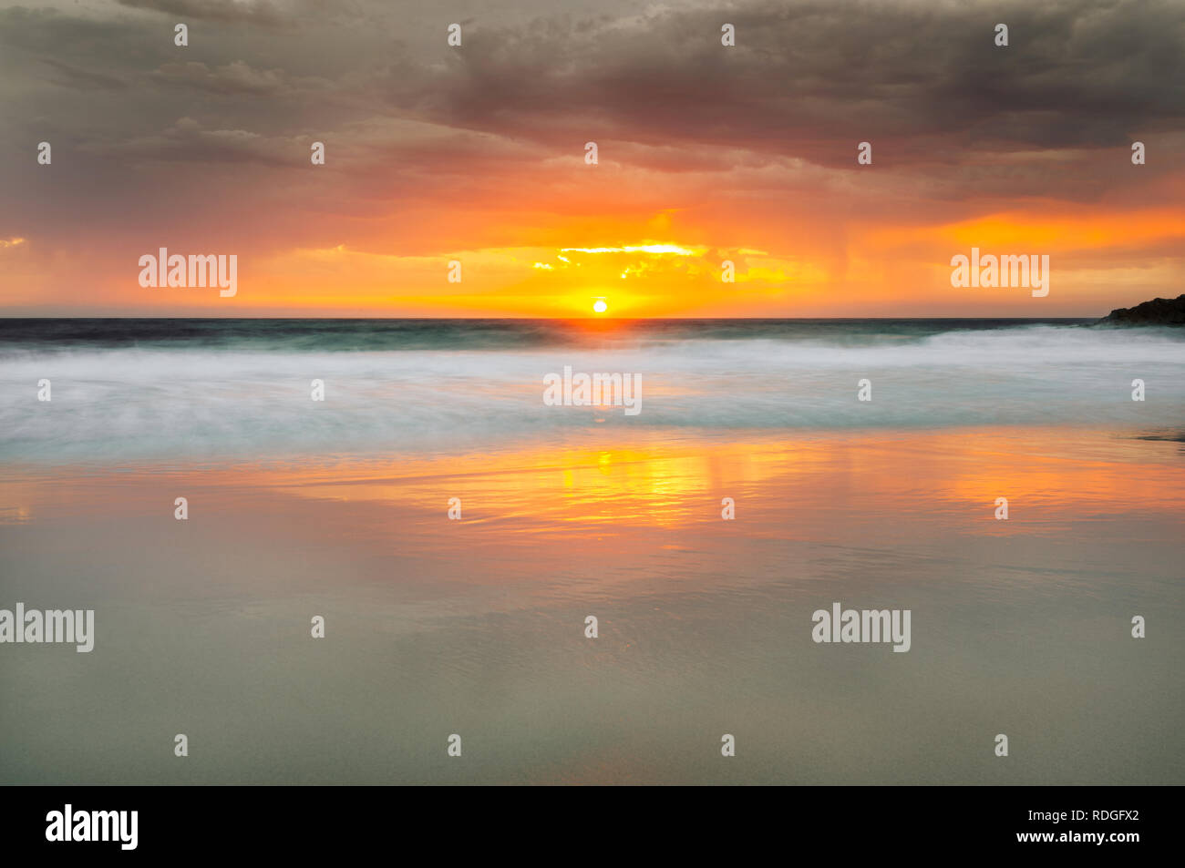 Colourful sunrise at Stumpys Bay. Stock Photo