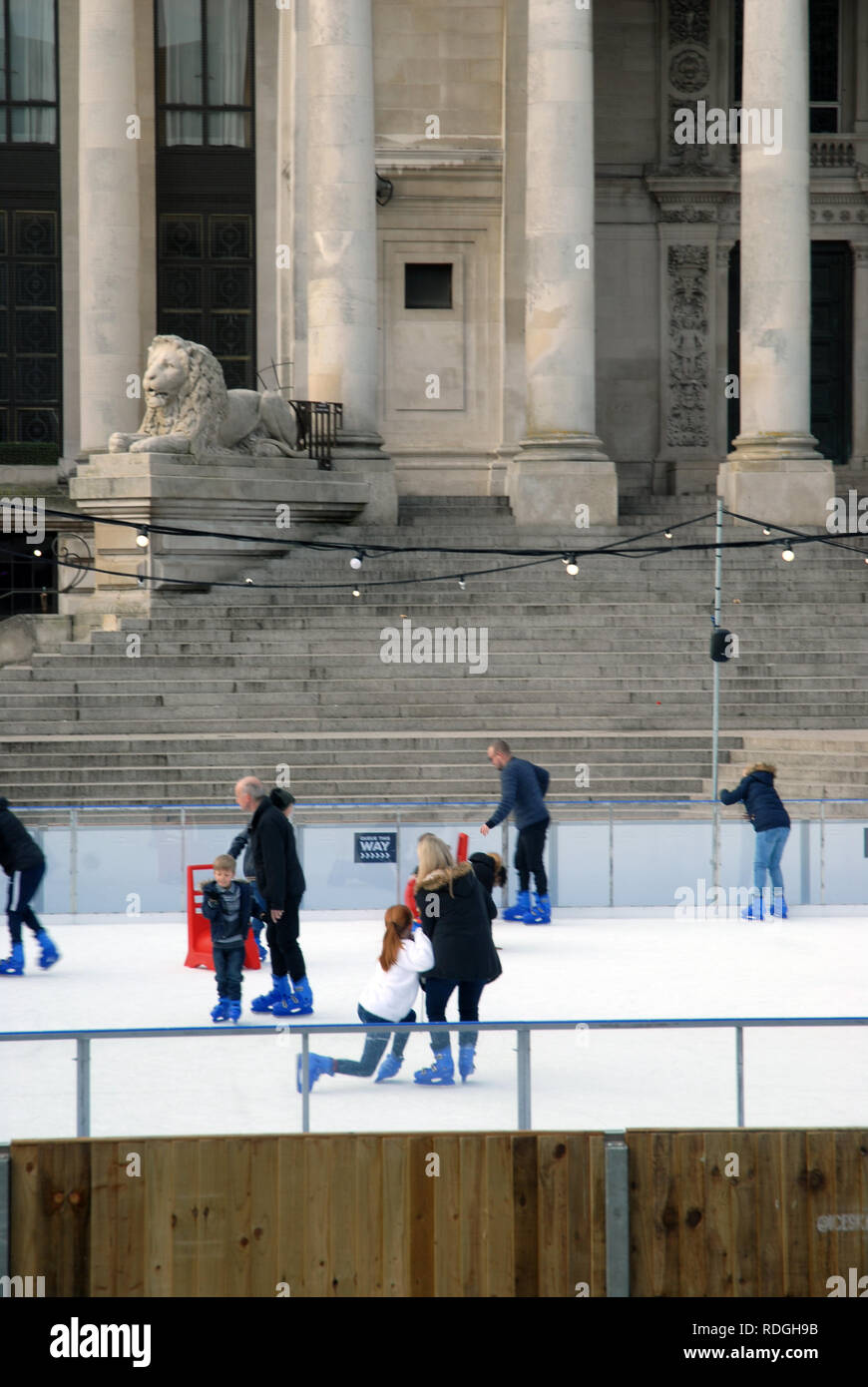 People Ice Skating On An Outdoor Ice Rink Guildhall Square