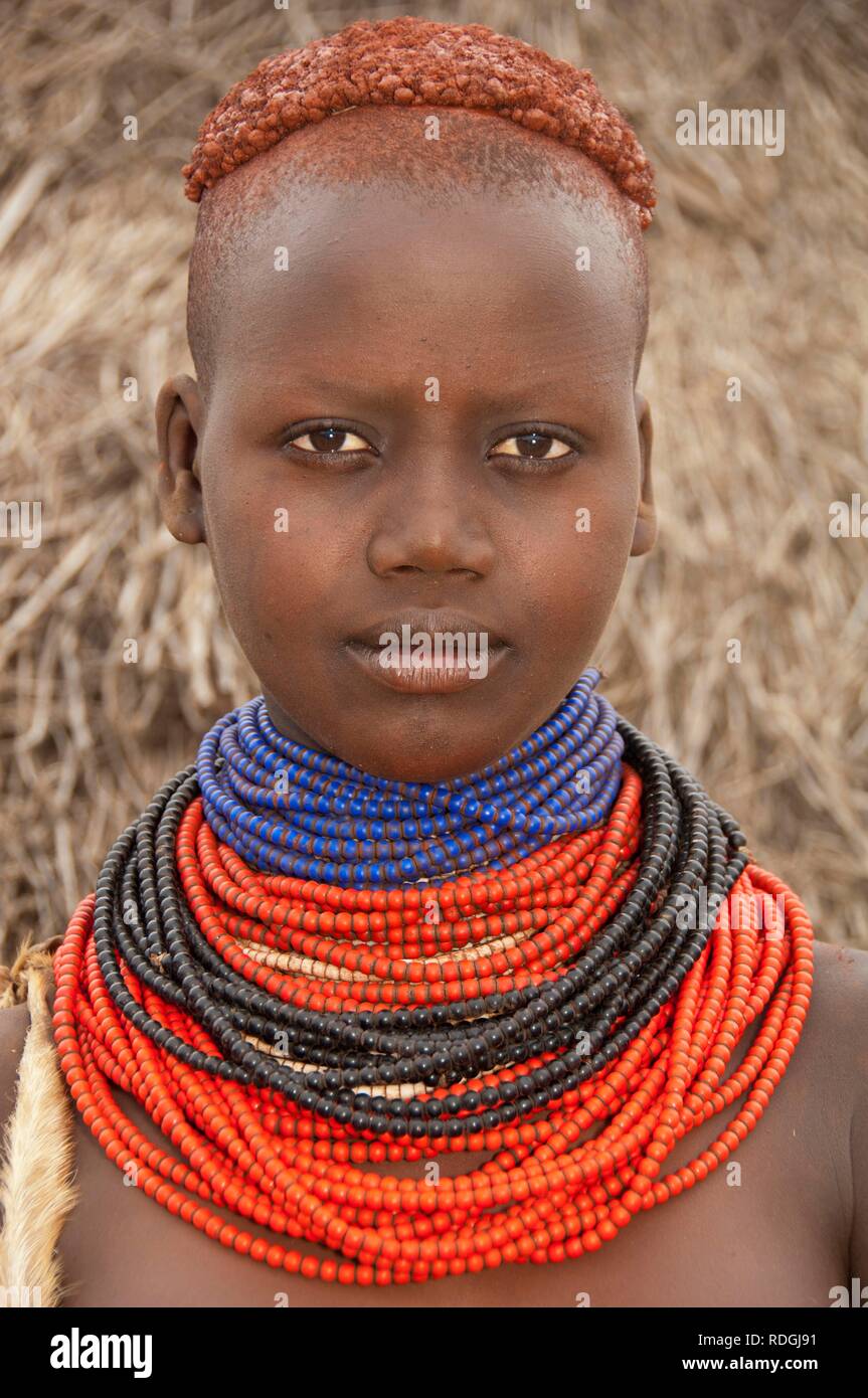 Young Karo woman with lots of colorful necklaces, portrait, Omo river valley, Southern Ethiopia, Africa Stock Photo