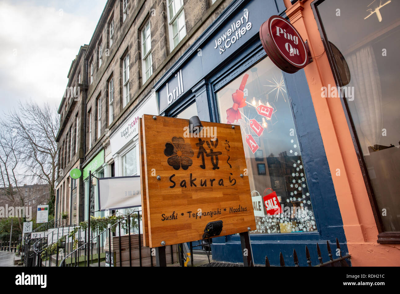High street shops and restaurants in Stockbridge,suburb of Edinburgh,Scotland Stock Photo