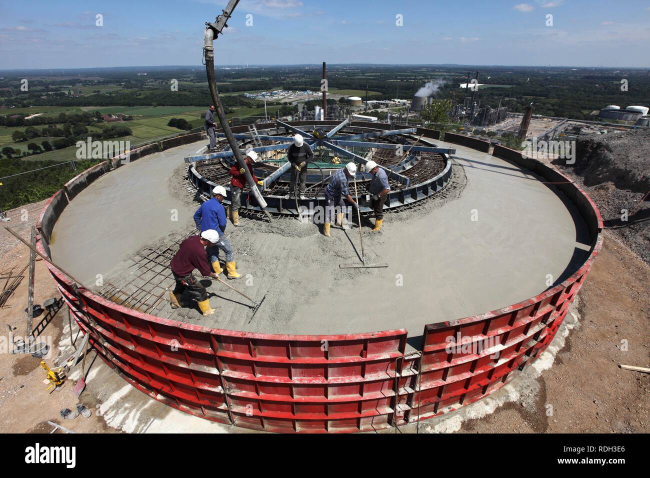 Concreting the foundations during the construction of a wind turbine on a mountain slope in Scholven, Gelsenkirchen Stock Photo