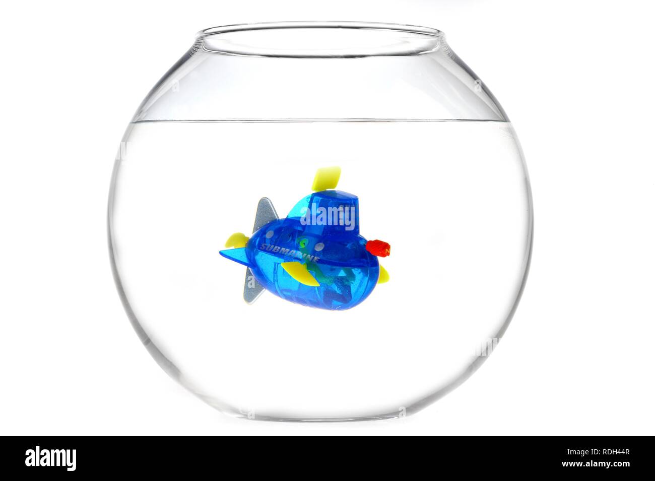 Wind-up toy mini-submarine in a fish bowl, illustration Stock Photo