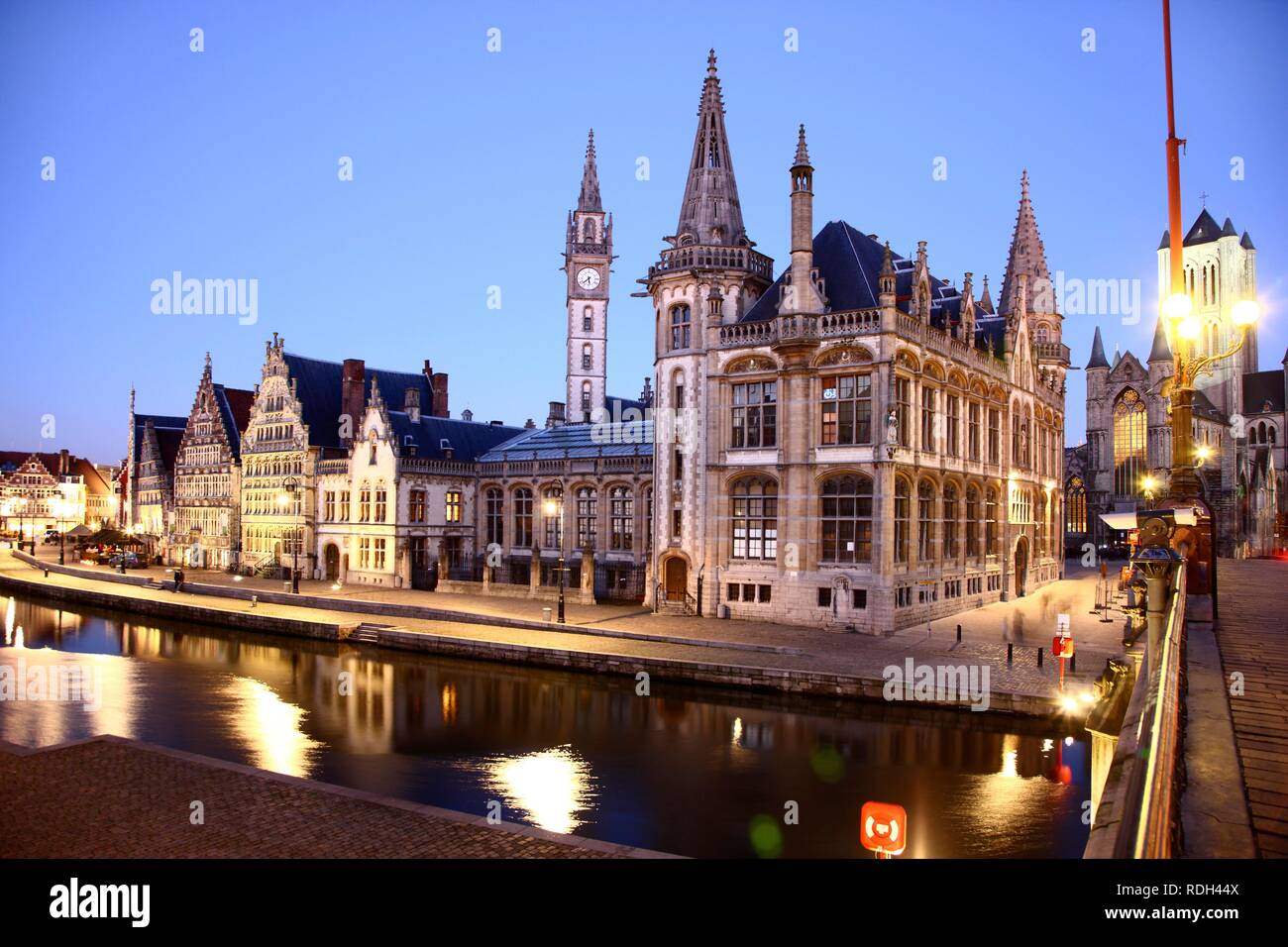 St. Michielsbrug bridge across the Leie River, view of the historic district, the former post office on the right Stock Photo