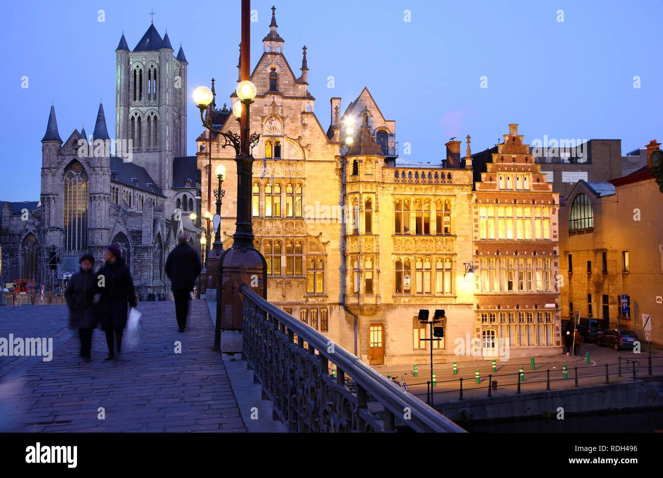 St. Michielsbrug bridge across the Leie River, view of the historic district with Saint Nicholas' Church Stock Photo