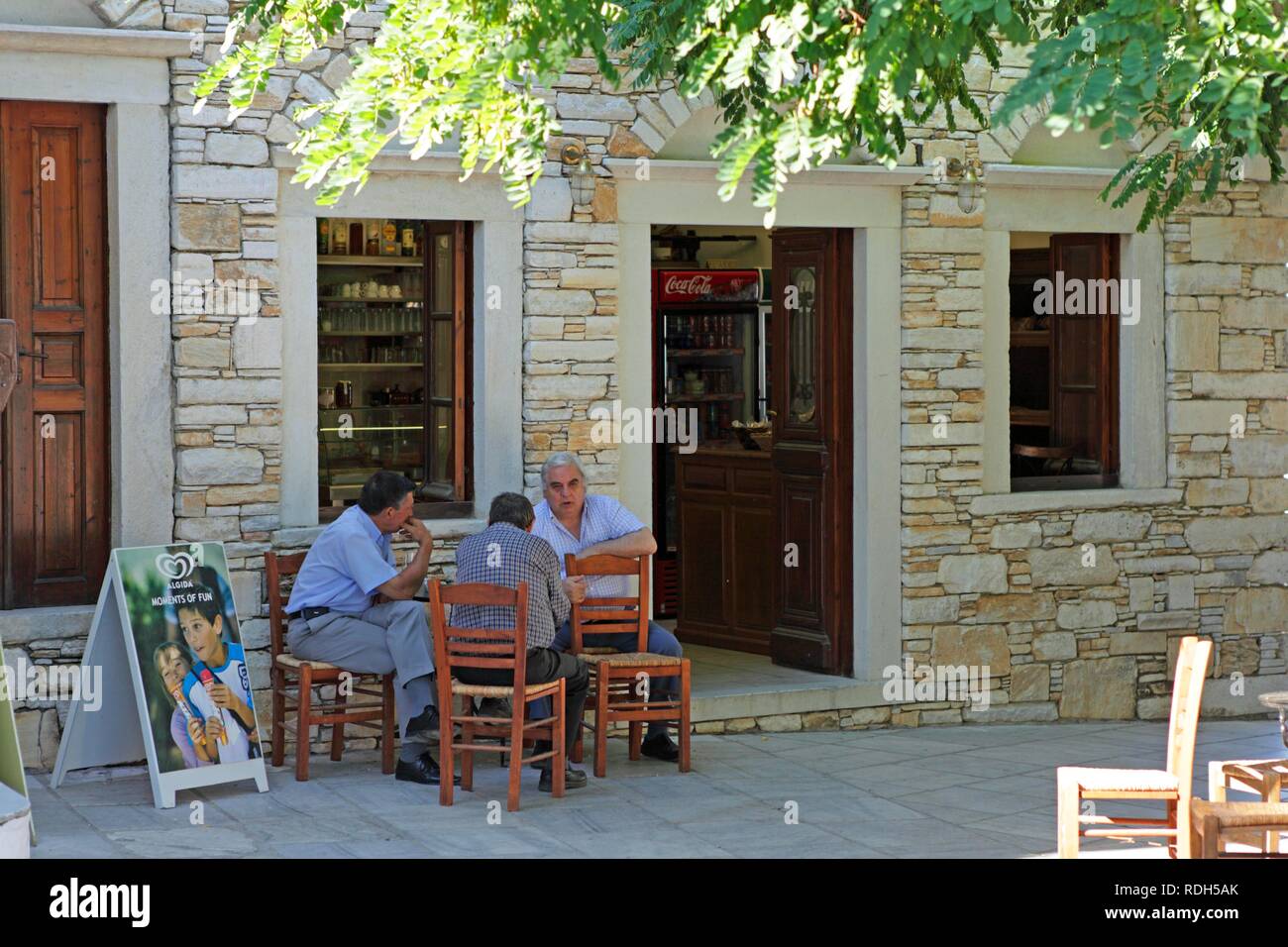 Men in a coffee house, Aperathos mountain village, Naxos island, Cyclades, Aegean Sea, Greece, Europe Stock Photo