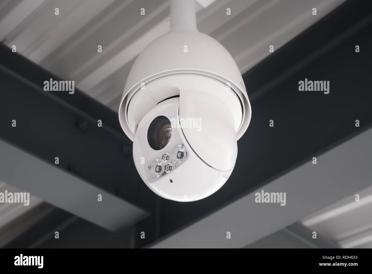 security camera hanging on ceiling cctv camera Stock Photo Alamy