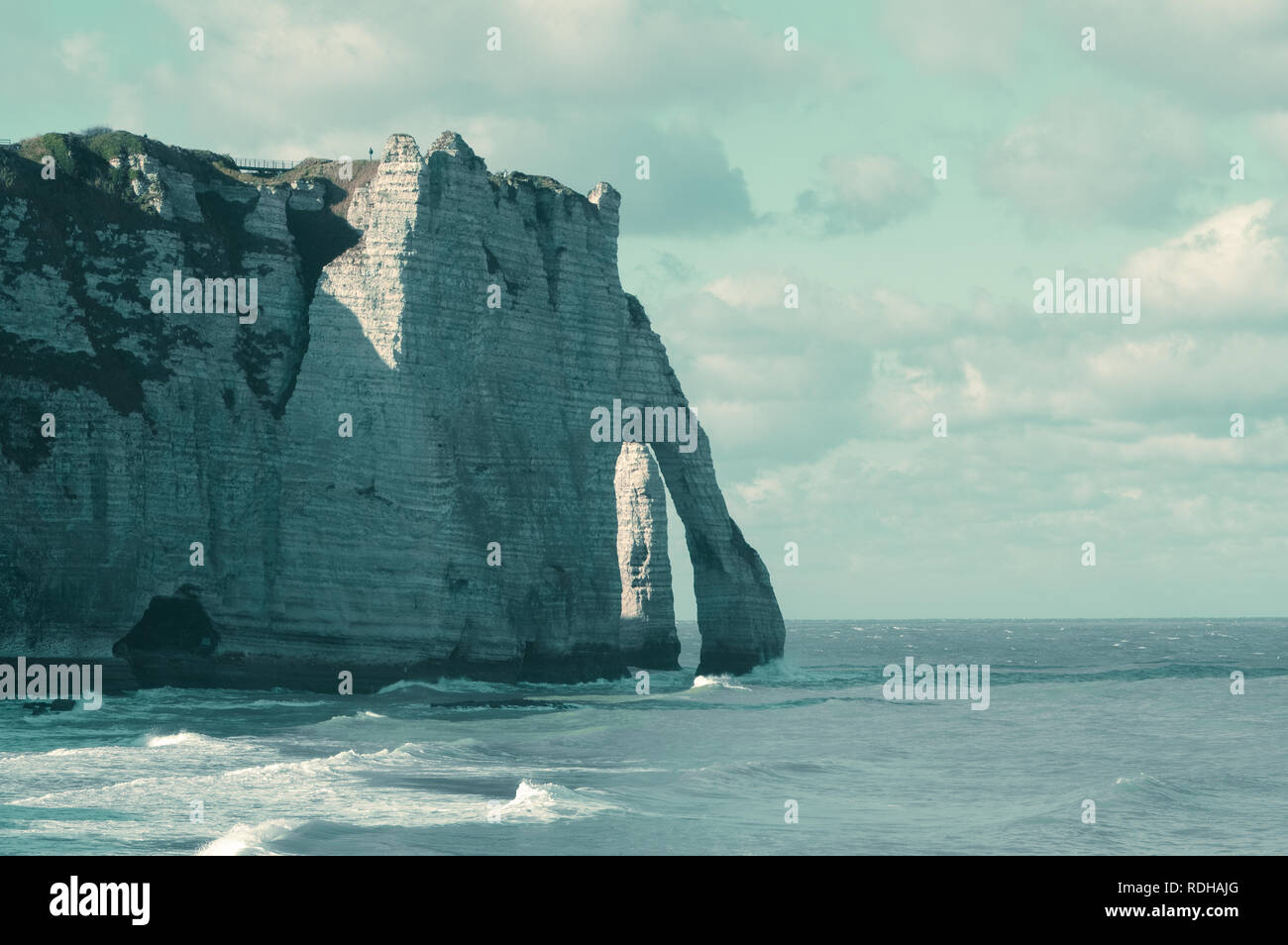Famous natural cliffs in Etretat. Etretat is a commune in Seine