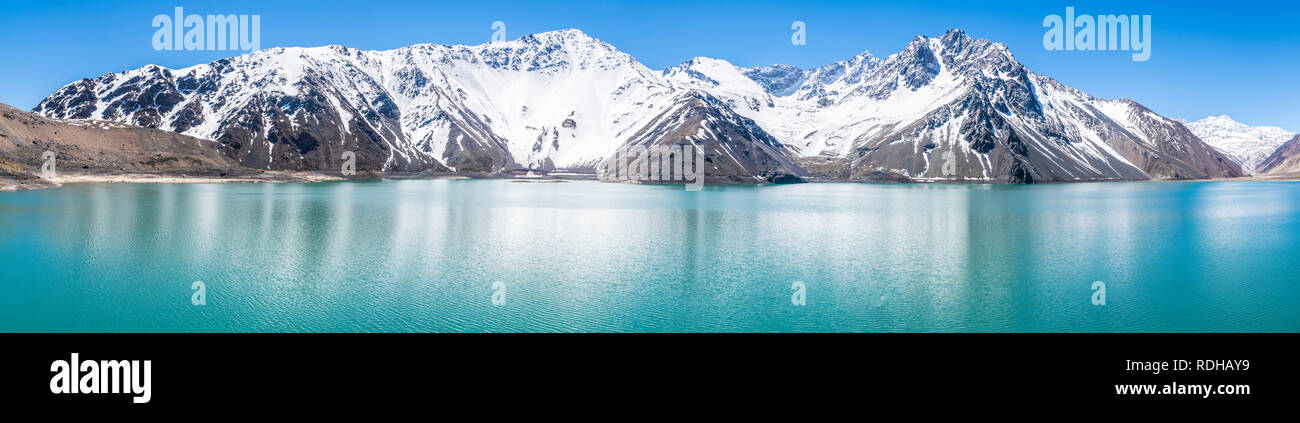 Embalse del Yeso (Yeso Dam) awe high altitude turquoise waters lake inside an amazing rugged landscape. Steep mountains on an awe scenery Stock Photo