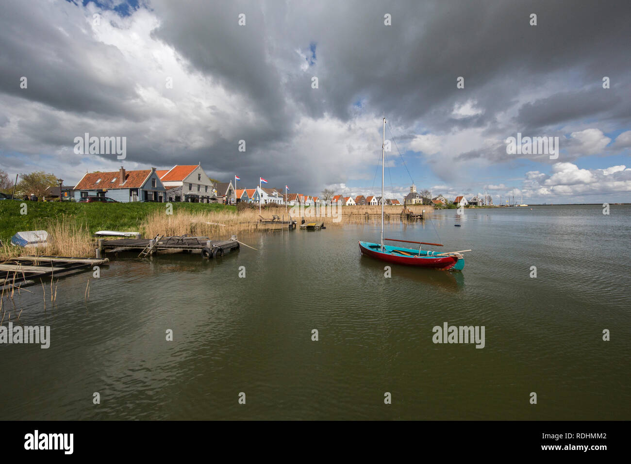 Threatening clouds and hailstorm. Lake called IJmeer. Durgerdam, Amsterdam, The Netherlands. Stock Photo