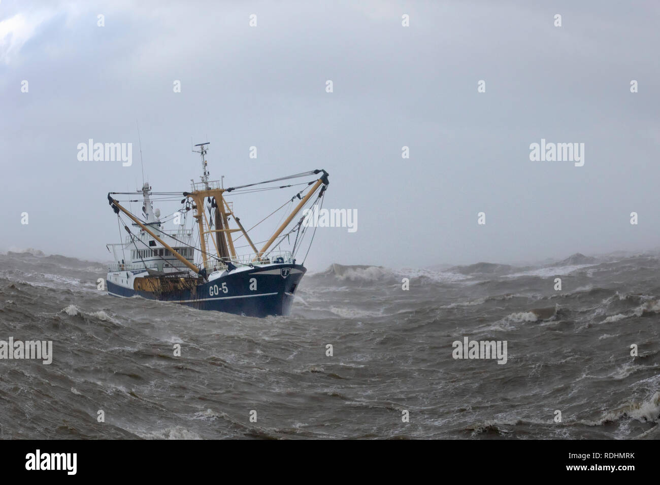 The Netherlands, IJmuiden, Fishing boat in rough weather, storm Stock
