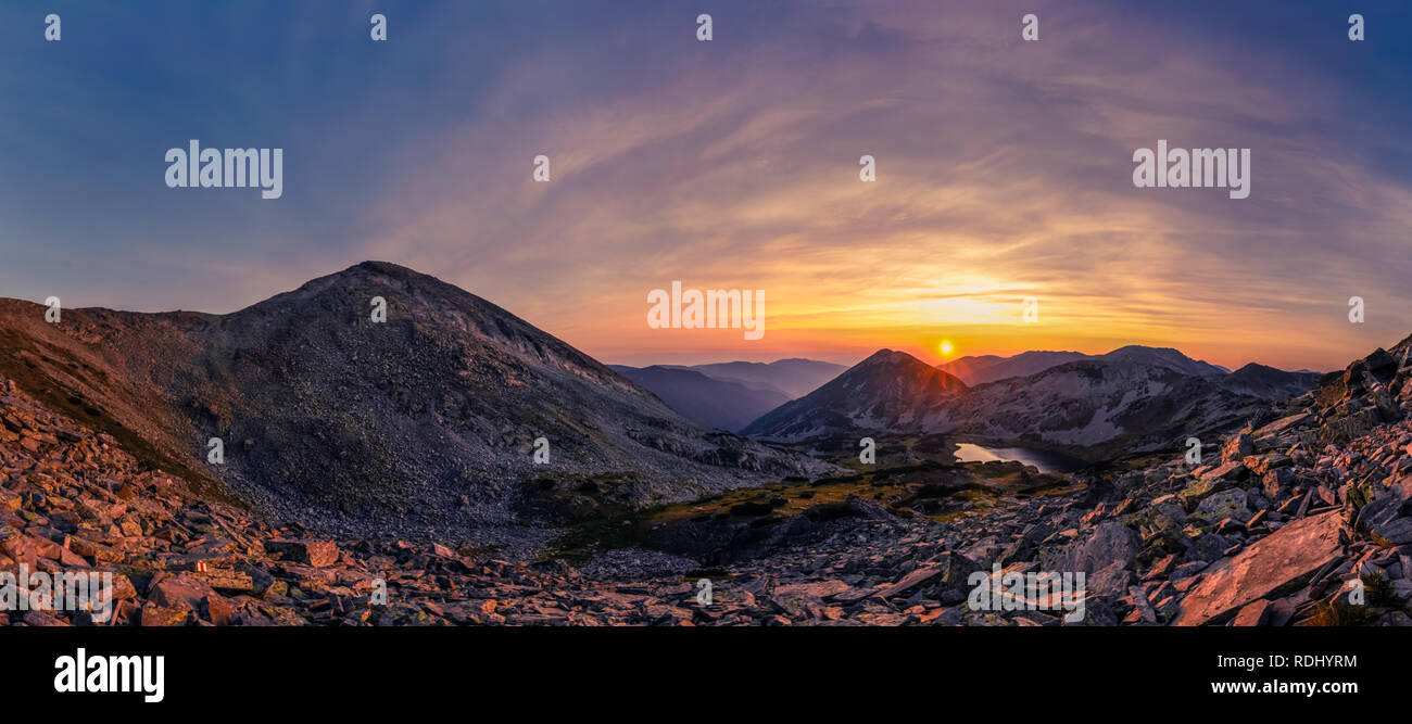 Romantic sunset in Bulgarian mountains on summer day. Stock Photo