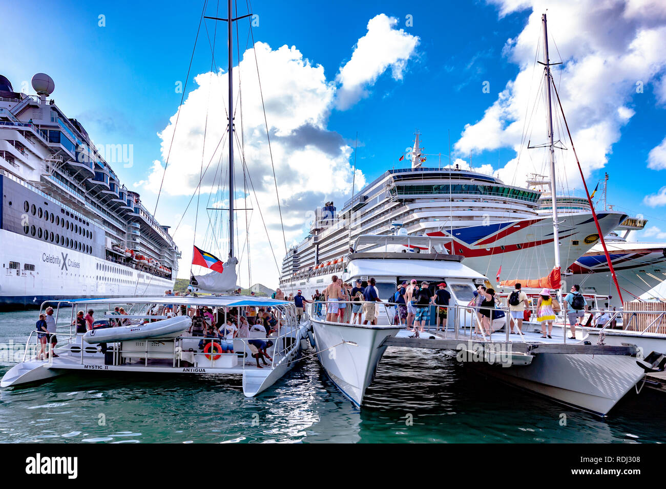 P&O Arcadia and Celebrity Summit moored on Christmas Eve at St John's