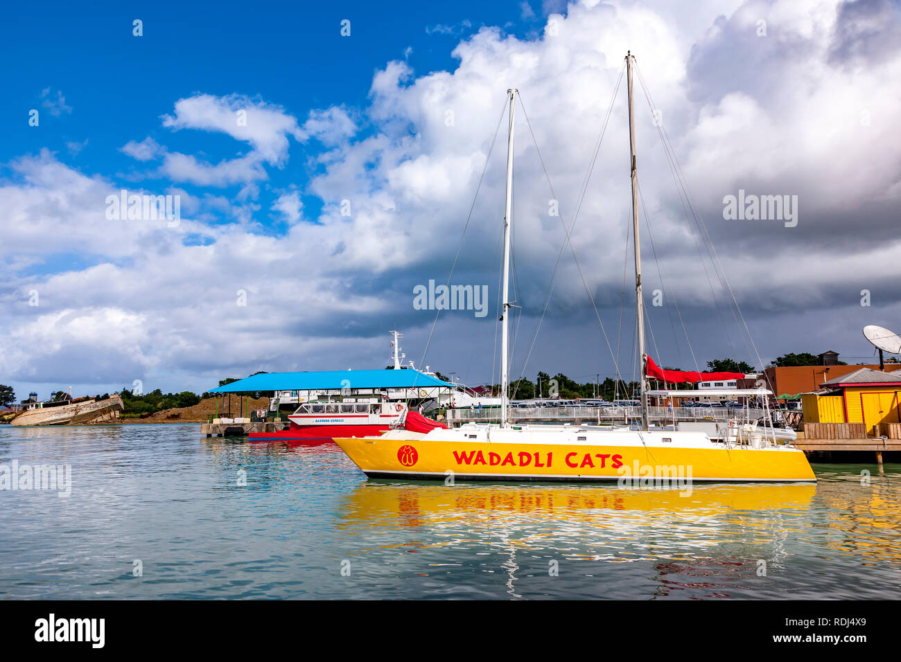 Wadadli Cats moored St John's, Antigua, in the Leeward Islands of the Caribbean Stock Photo