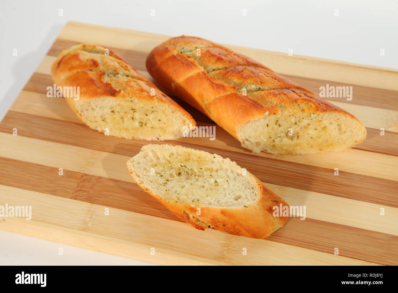 French dine concept, brown garlic butter baguette Stock Photo Alamy