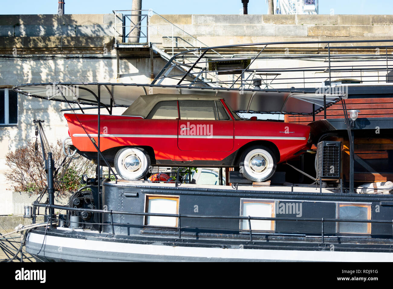 Classic Amphicar 770 parked on the boat along the Canal St-Martin in Paris, France. Stock Photo