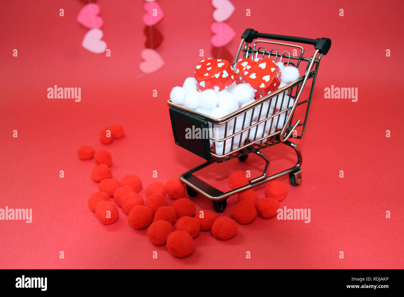 Gift box with red theme Stock Photo - Alamy
