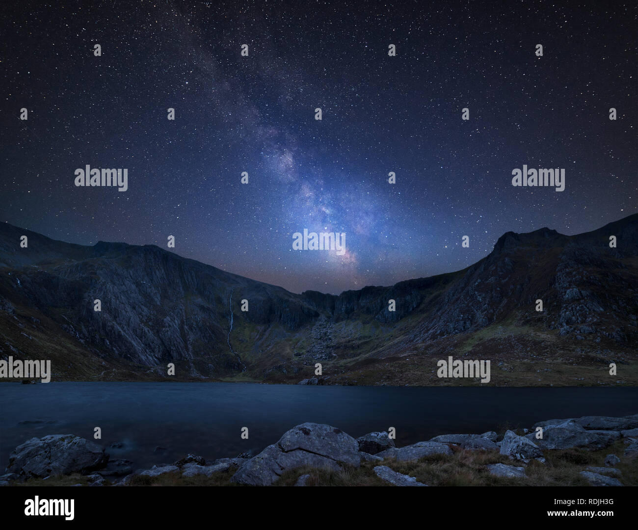 Stunning vibrant Milky Way composite image over Beautiful landscape ...