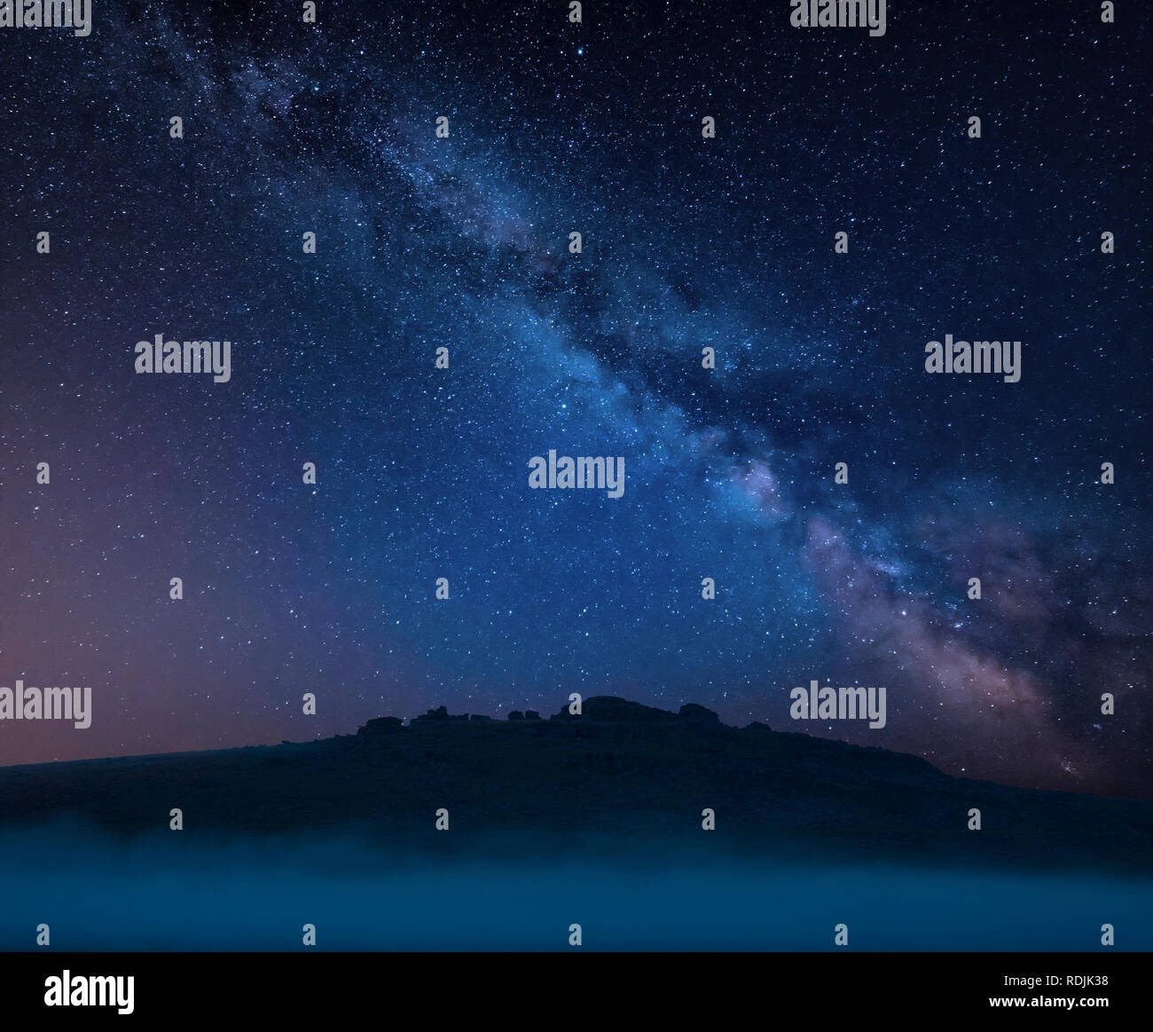 Stunning vibrant Milky Way composite landscape image over the tors in ...