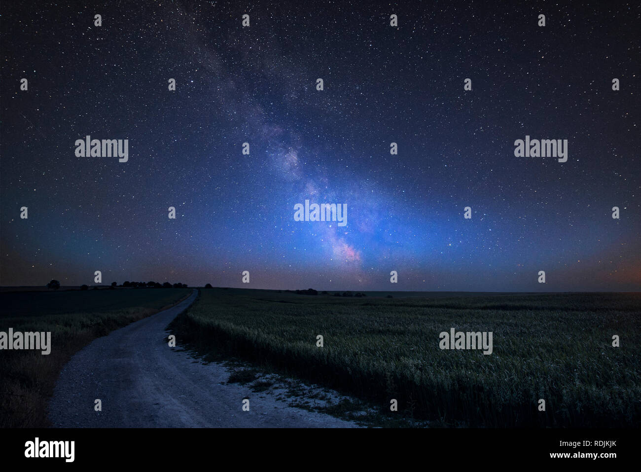 Stunning vibrant Milky Way composite image over landscape of Steyning ...
