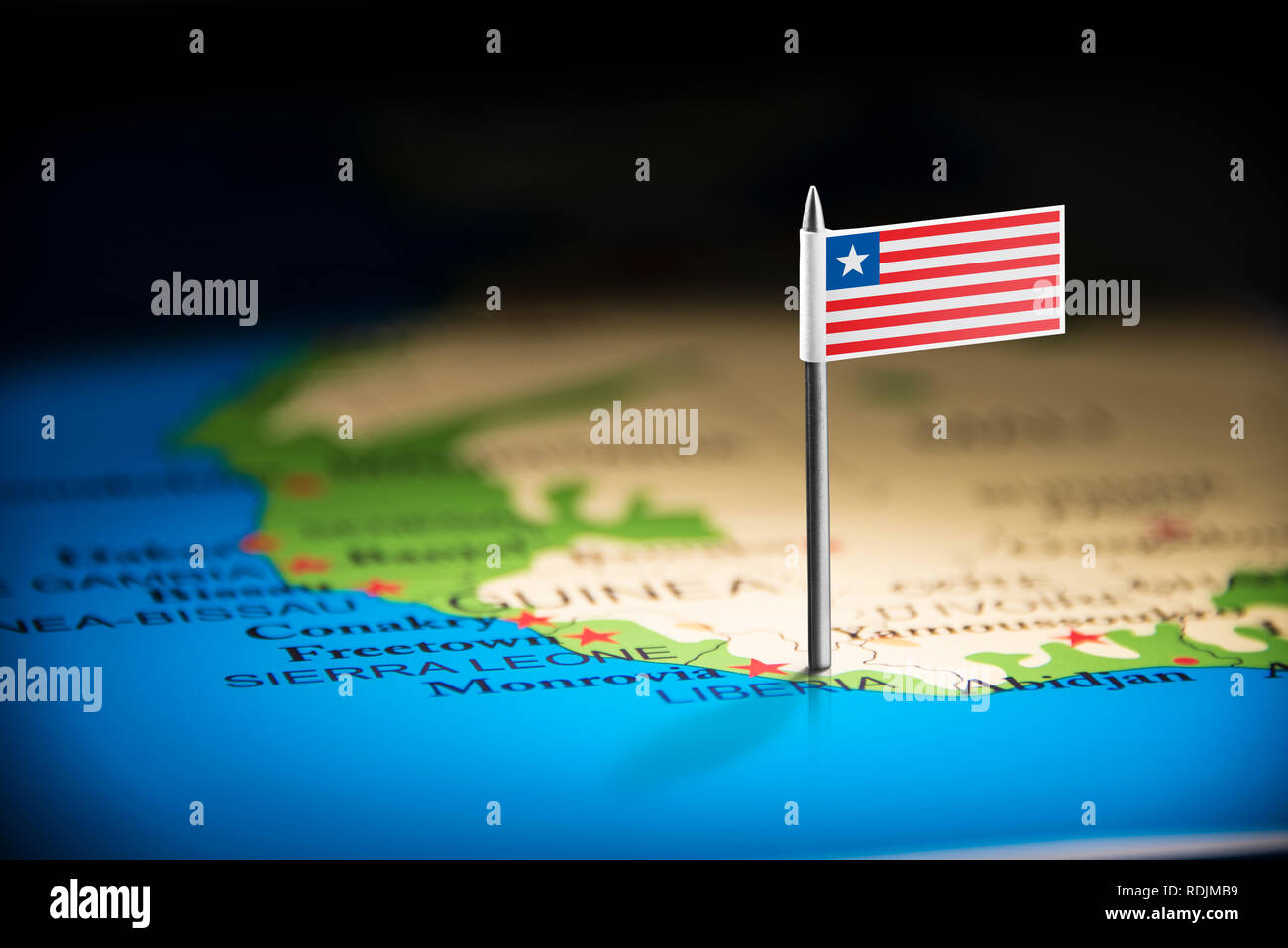 Liberia marked with a flag on the map Stock Photo - Alamy