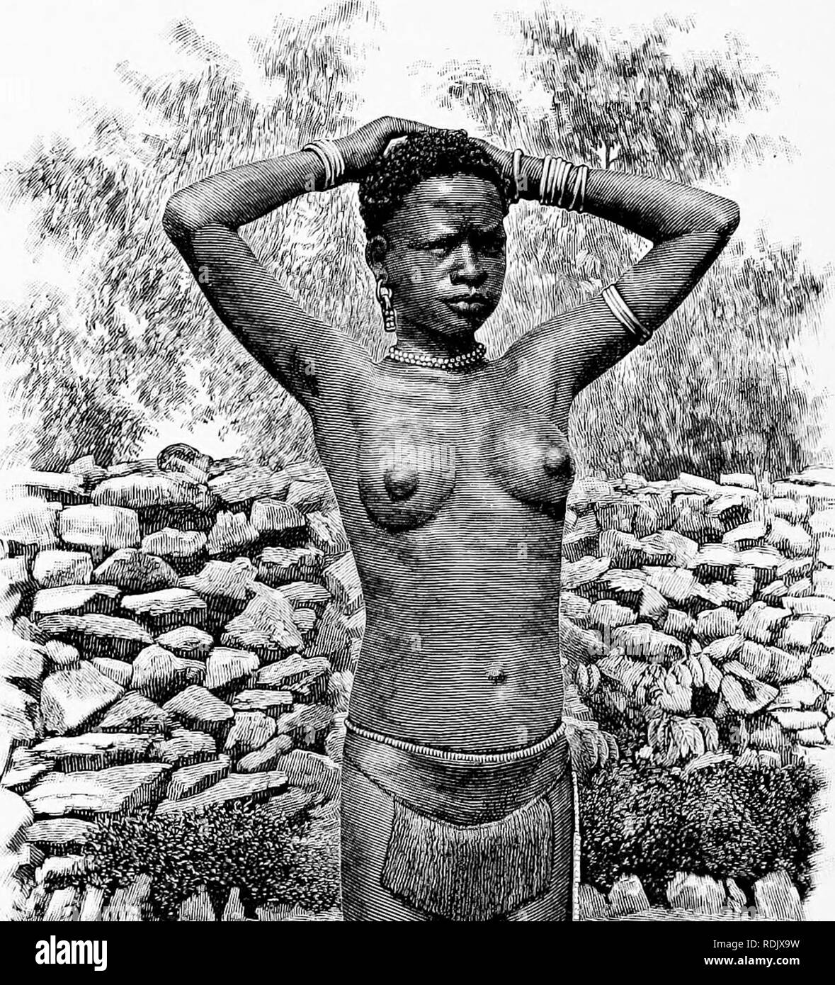 . Man and beast in eastern Ethiopia : From observations made in British East Africa, Uganda, and the Sudan . Natural history; Indigenous peoples; Ethnology. 144 EASTERN ETHIOPIA XII snipping off the piece so raised. For the second victim a patch of similar scars is made on tlie shoulder, for the third on the chest, and so on. The left side is similarly. ^^*r â ''^-^^. Please note that these images are extracted from scanned page images that may have been digitally enhanced for readability - coloration and appearance of these illustrations may not perfectly resemble the original work.. Bland-Su Stock Photo