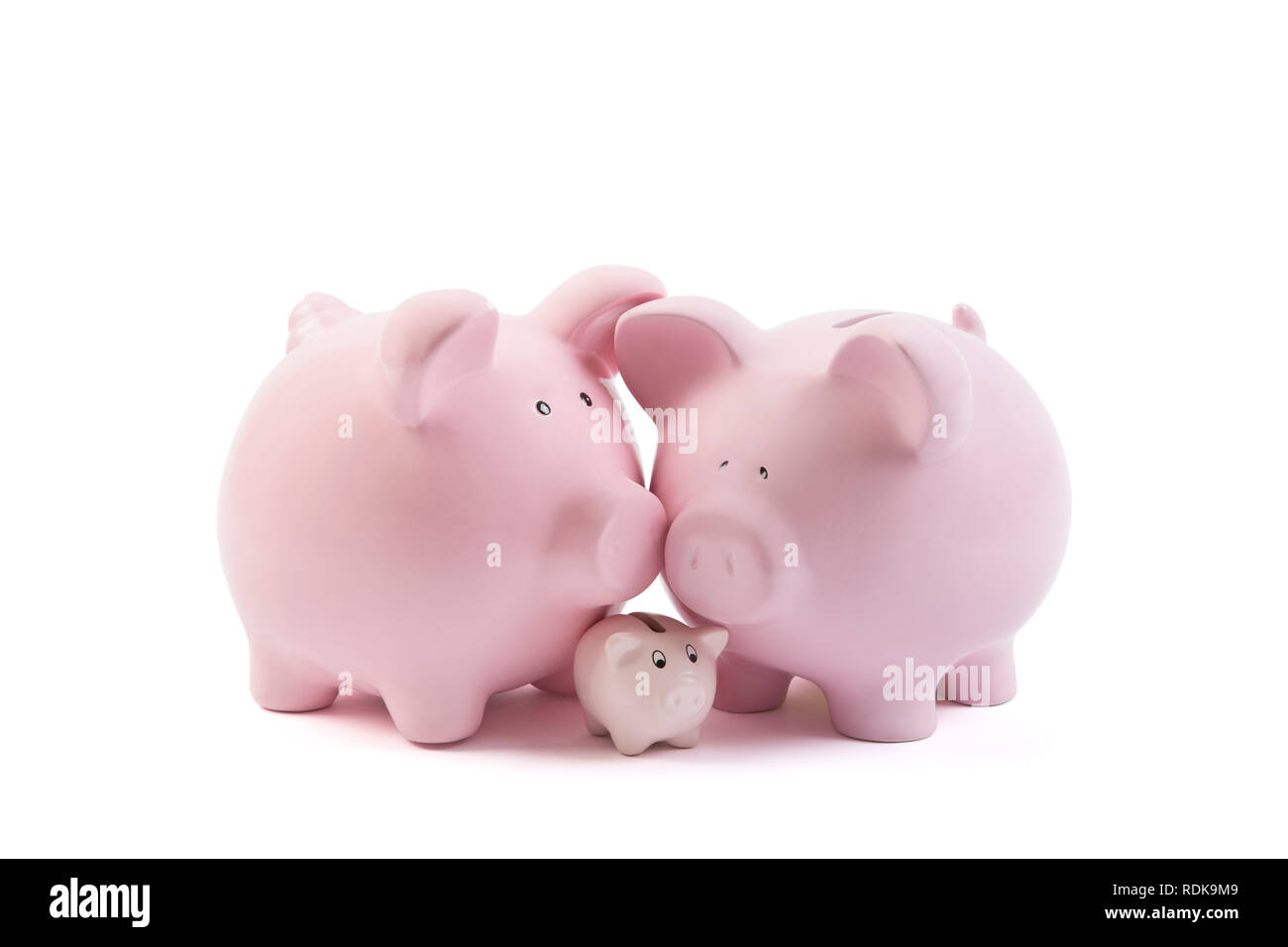 Three piggy banks on white background with clipping path Stock Photo