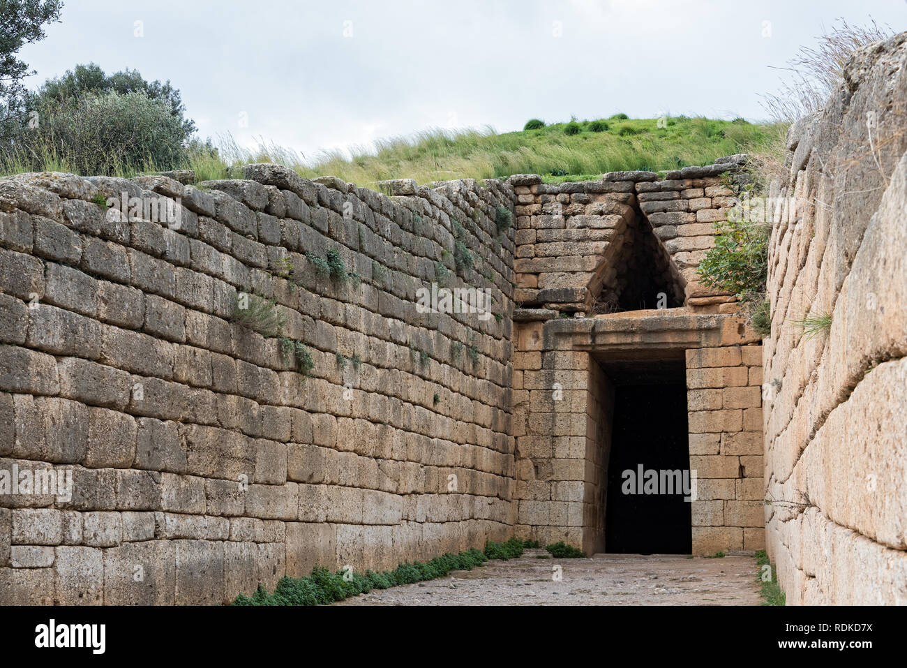 The entrance of the Tholos Tomb of Agamemnon at the archaeological site of Mycenae in Peloponnese, Greece Stock Photo