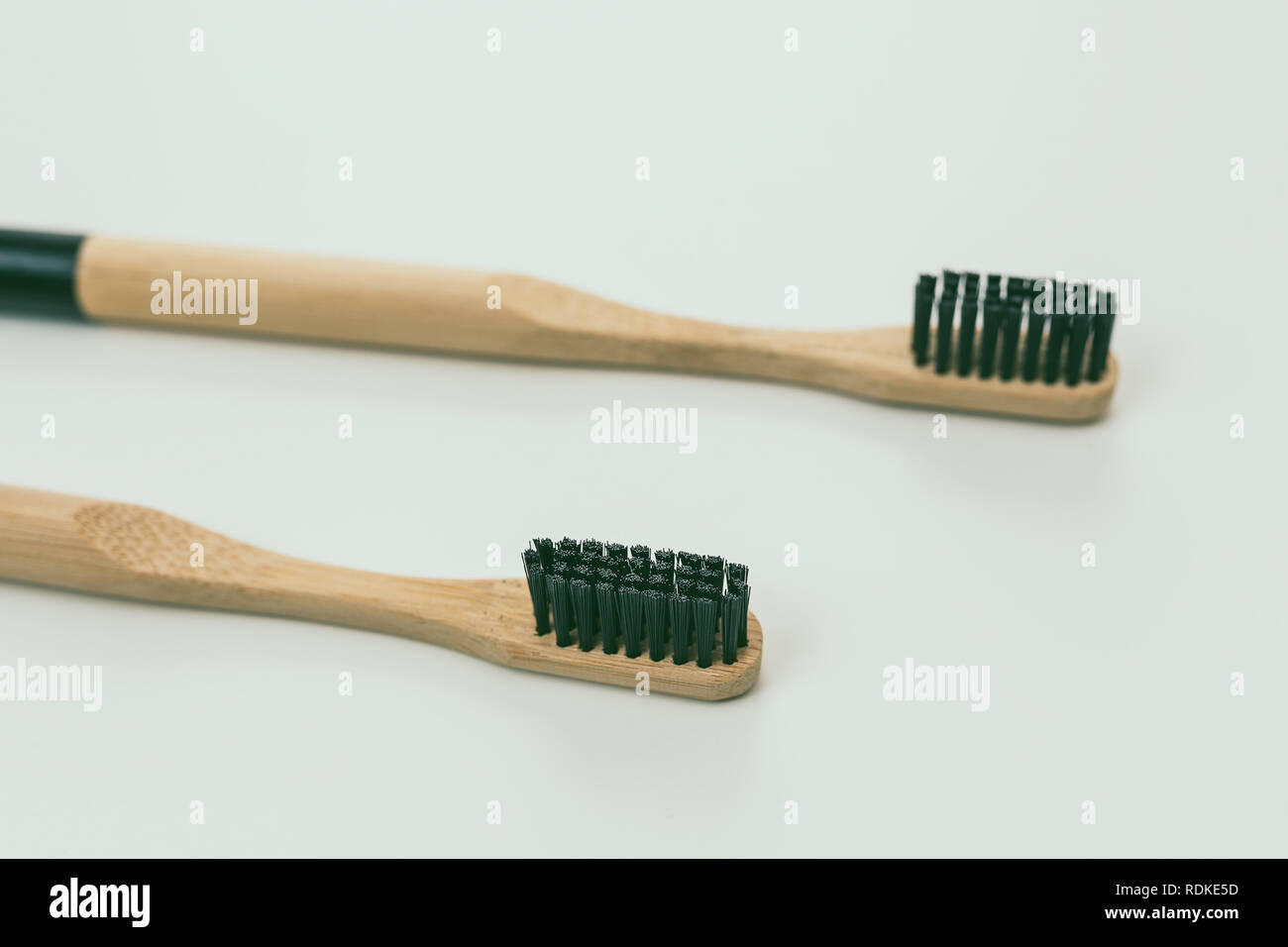 Bamboo toothbrush, closeup view, isolated on white background Stock Photo