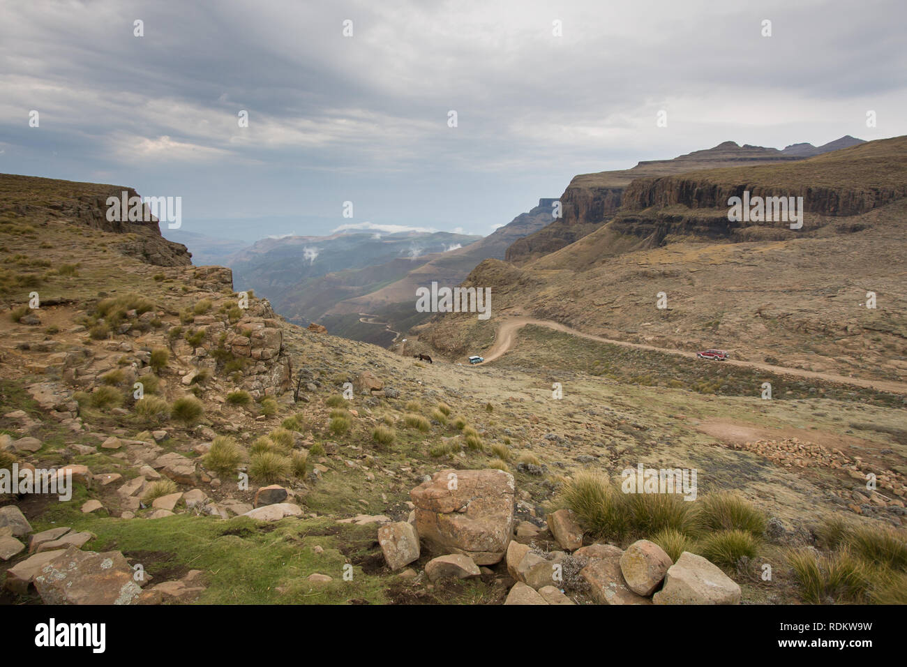 Sani Pass is a famous 4x4 dirt road that conects KwaZulu-Natal in South Africa to Thaba-Tseka in Lesotho. South Arican border control is at the bottom. Stock Photo