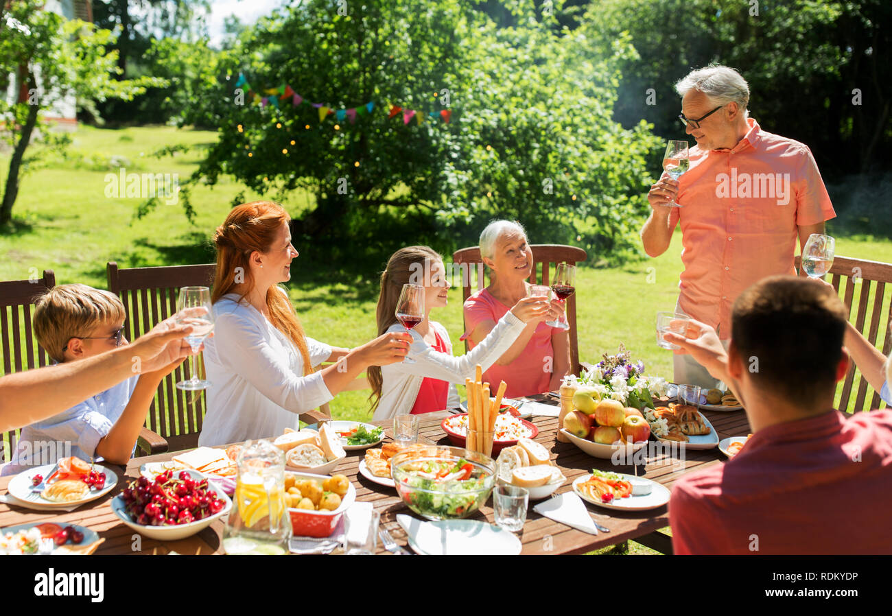 family gathering at summer garden and celebration Stock Photo