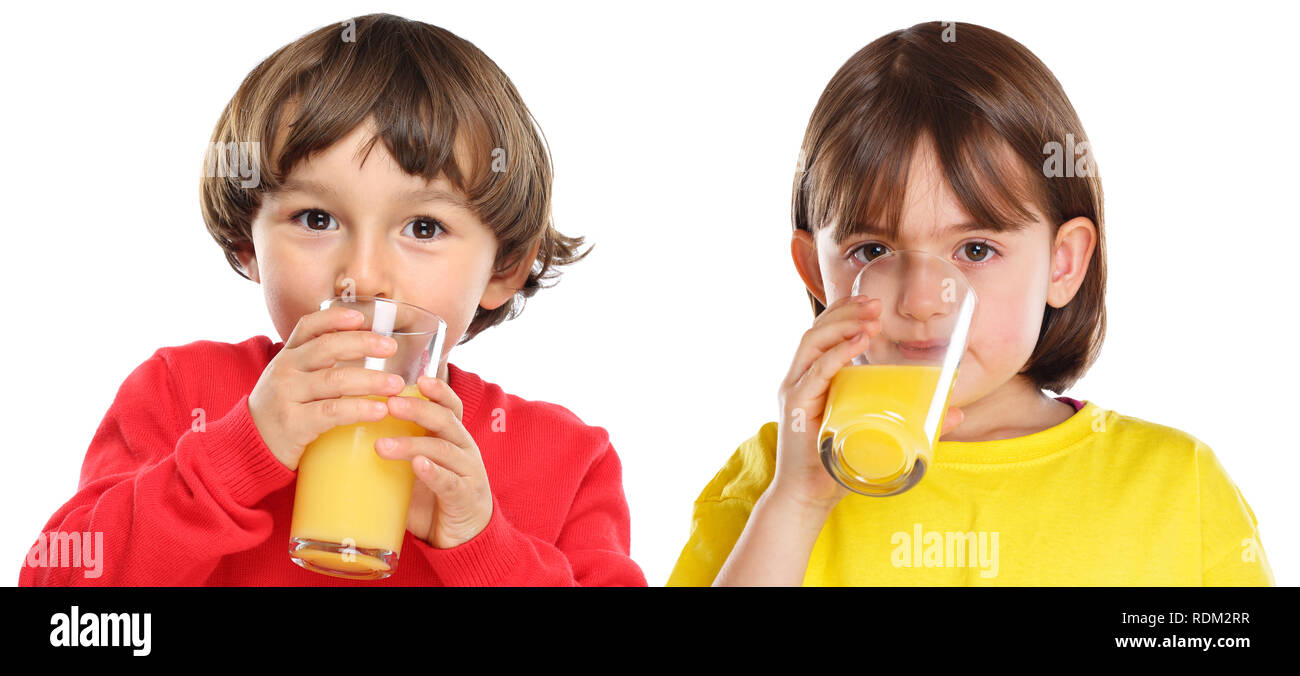 Children kids girl boy drinking orange juice healthy eating isolated on a white background Stock Photo