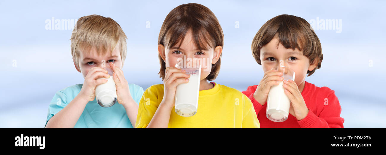 Children girl boy drinking milk kids glass healthy eating banner young Stock Photo