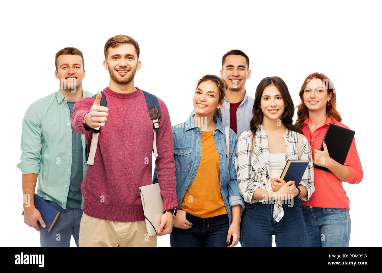 group of smiling students showing thumbs up Stock Photo - Alamy