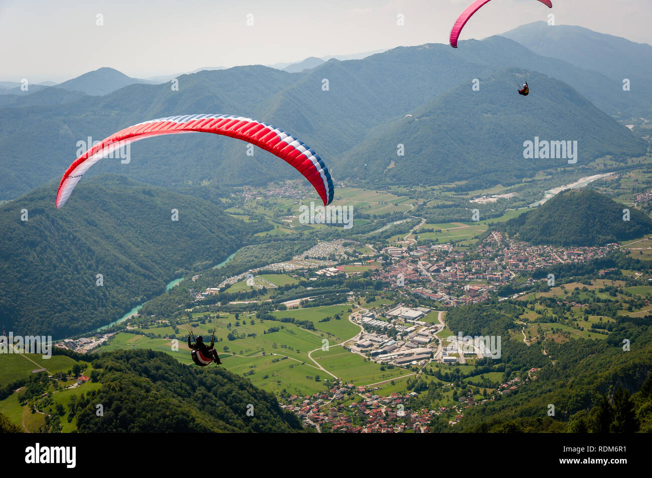 Parachute over Tolmin, Slovenia Stock Photo