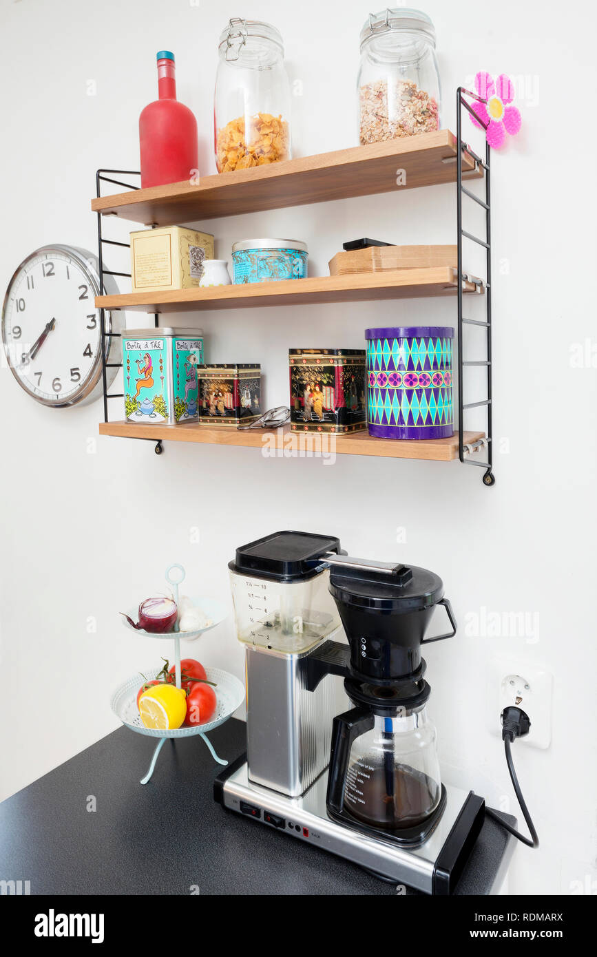 Coffee maker and shelf in kitchen Stock Photo Alamy