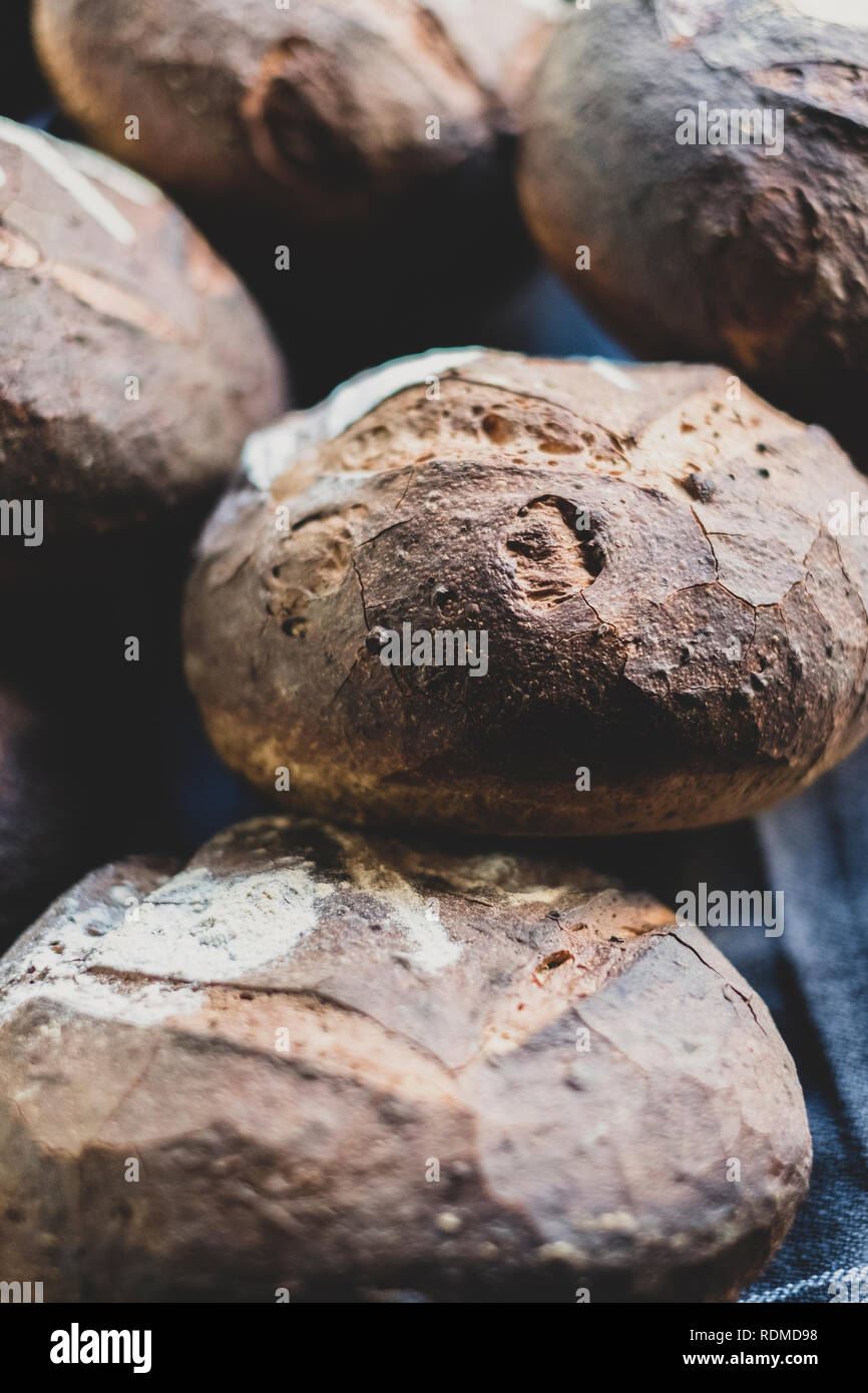 High angle close up of freshly baked loaves of bread. Stock Photo