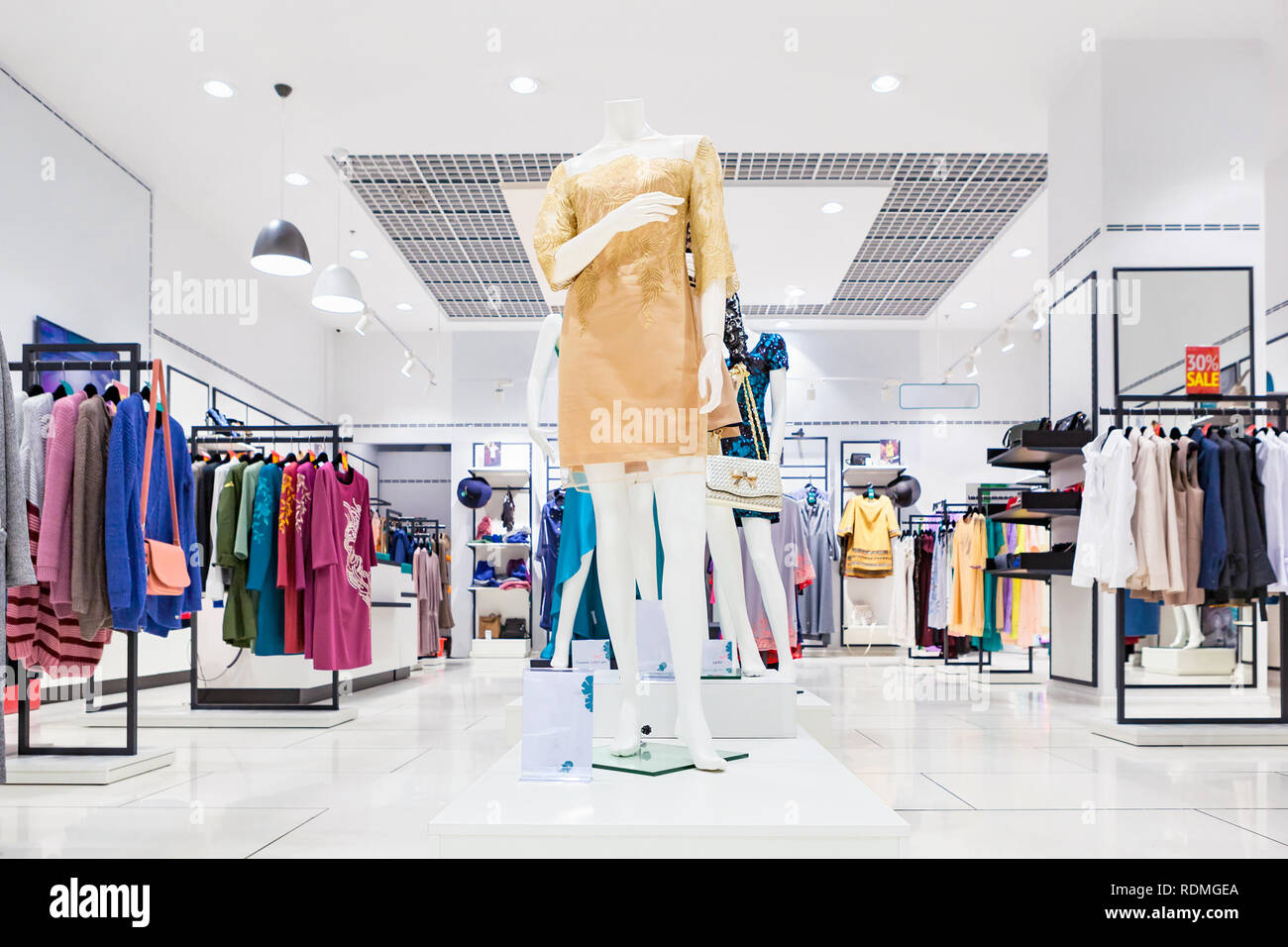 Interior of fashion clothing store for women. Stock Photo