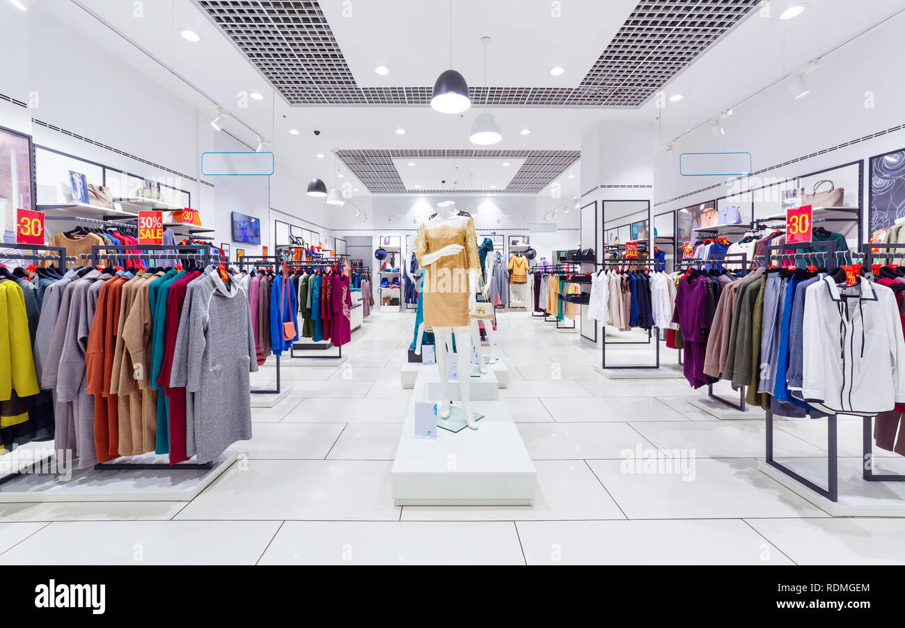 Interior of fashion clothing store for women. Stock Photo