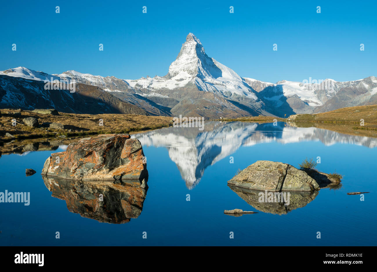 morning at Matterhorn and its reflection in a mountain lake Stock Photo