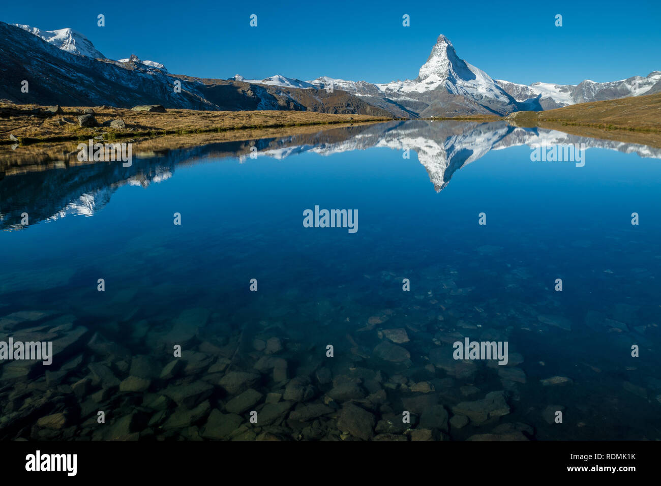 reflection of matterhorn in mountain lake Stock Photo