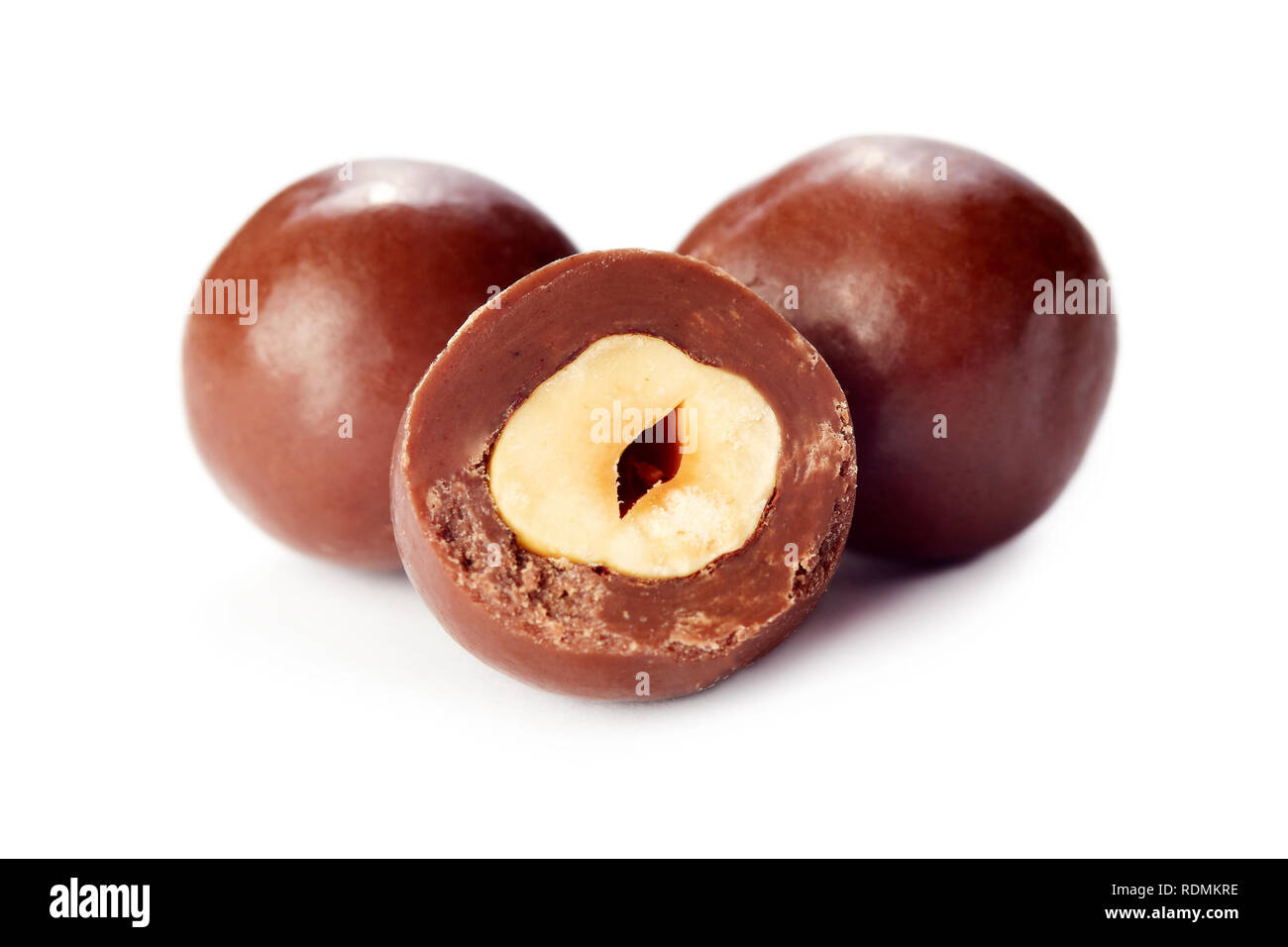 Hazelnut chocolate balls candy isolated on white background Stock Photo
