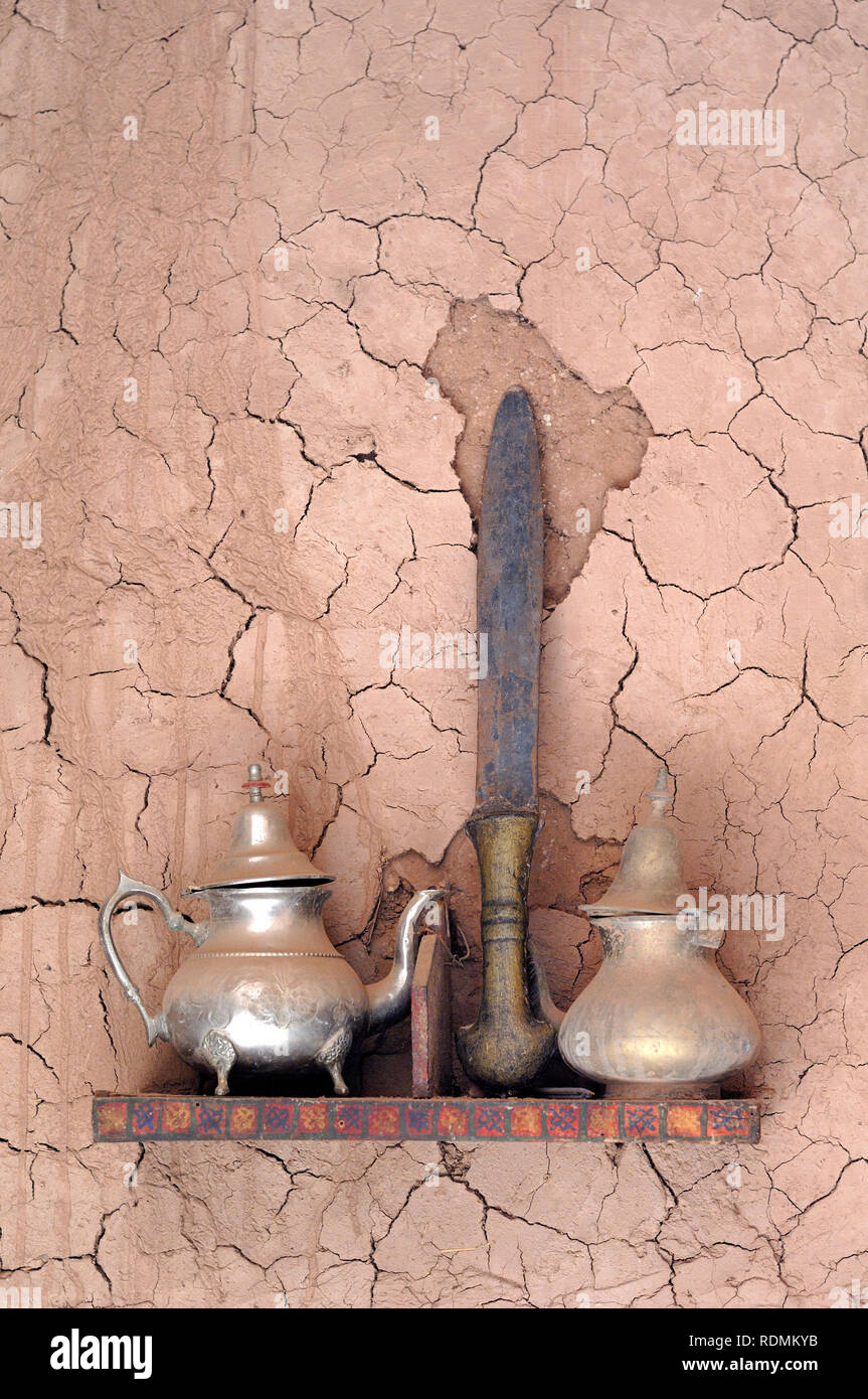 Shelf & Teapot Still Life in Moroccan Kitchen inside Adobe House Ait Benhaddou Morocco Stock Photo