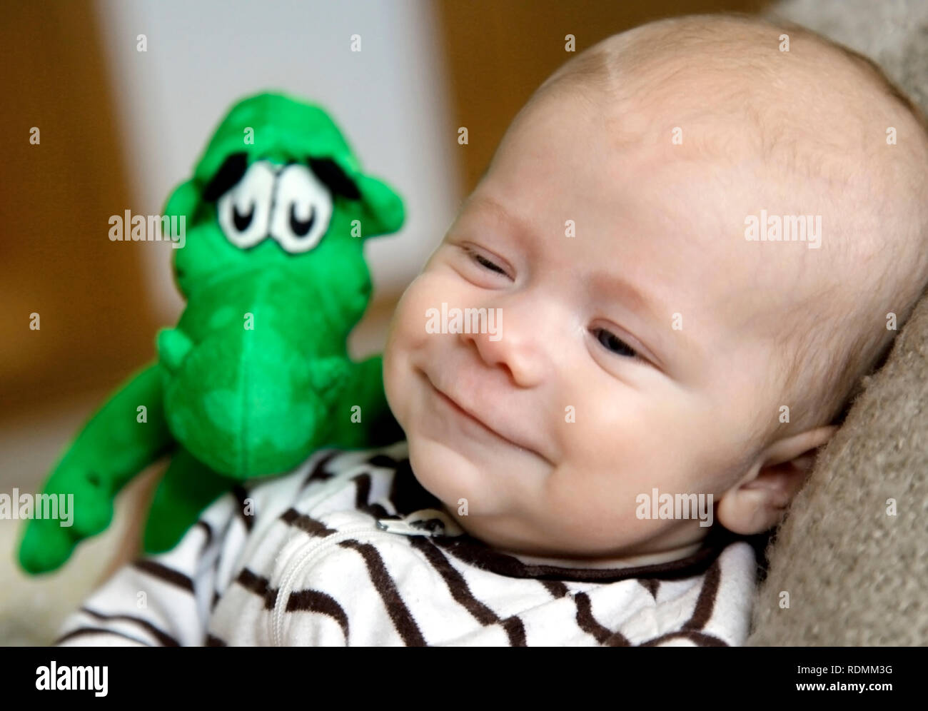 baby with stuffed animal Stock Photo