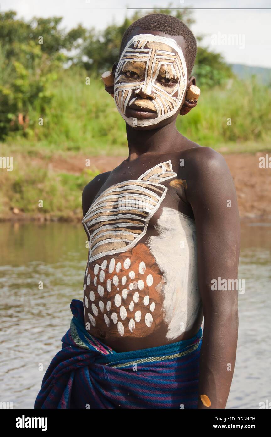 Surma Girl With Facial And Body Painting And Earlobe Plates Kibish surma-girl-with-facial-and-body-painting-and-earlobe-plates-kibish
