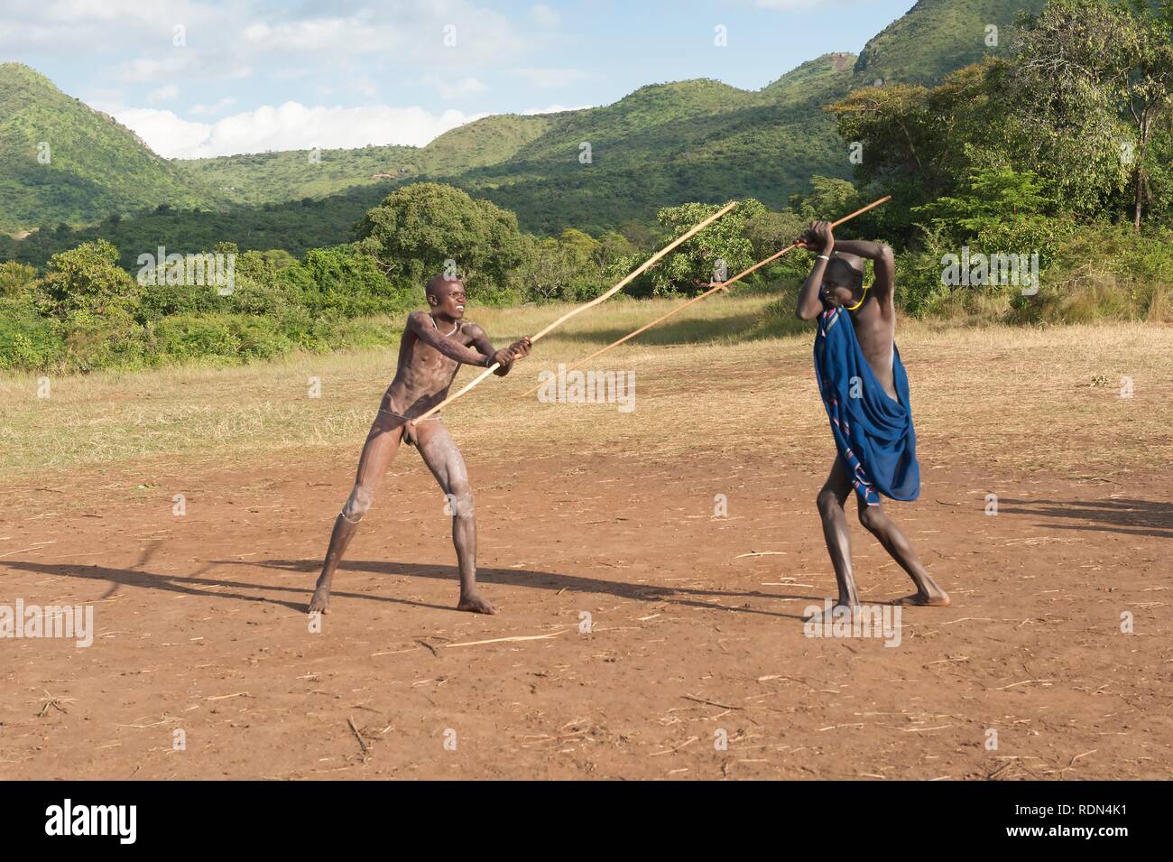 AFRIPICS - Two traditional Xhosa men stick fighting out in the open