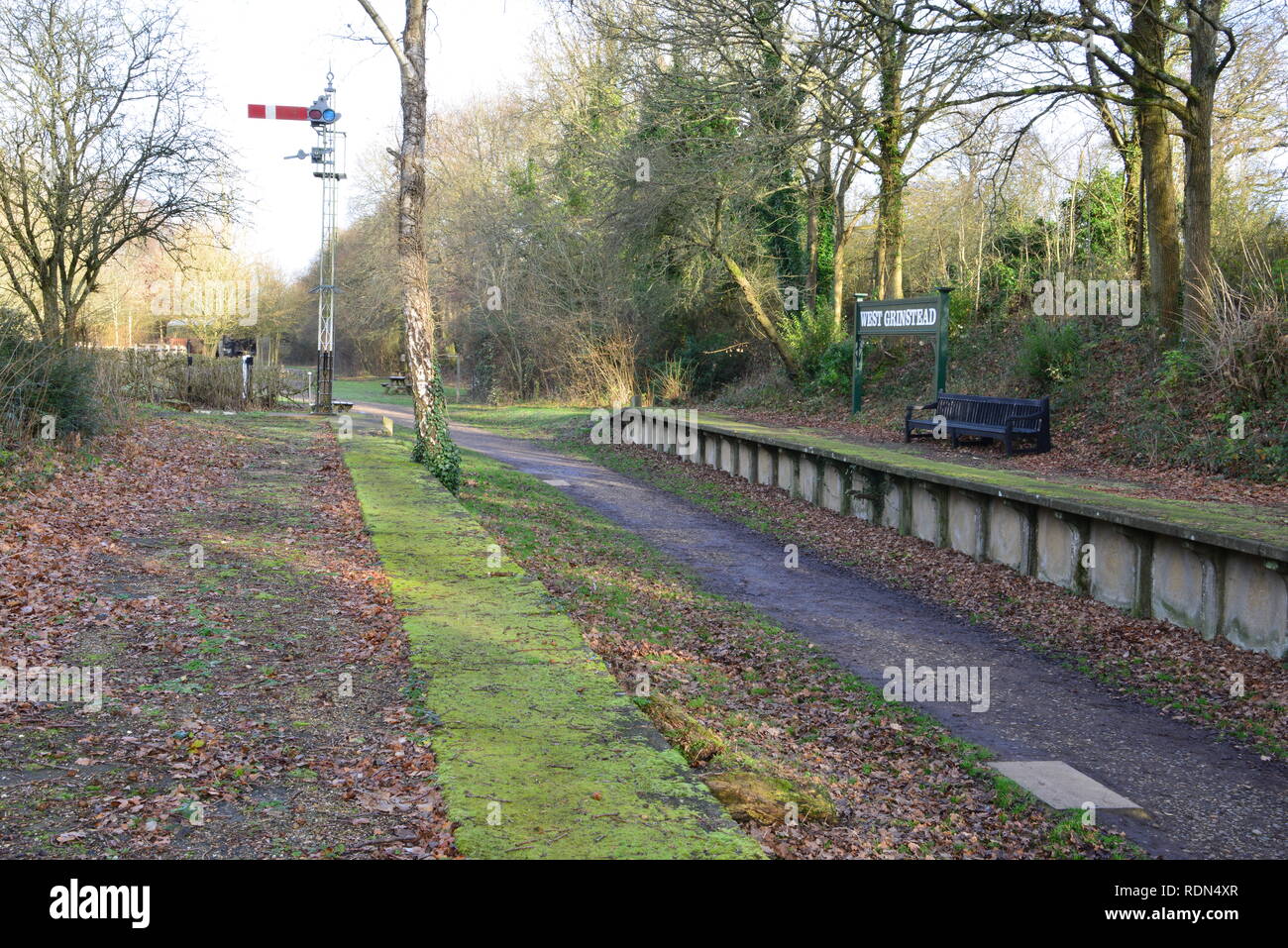 Closed and abandoned railway station at West Grinstead in West Sussex Stock Photo