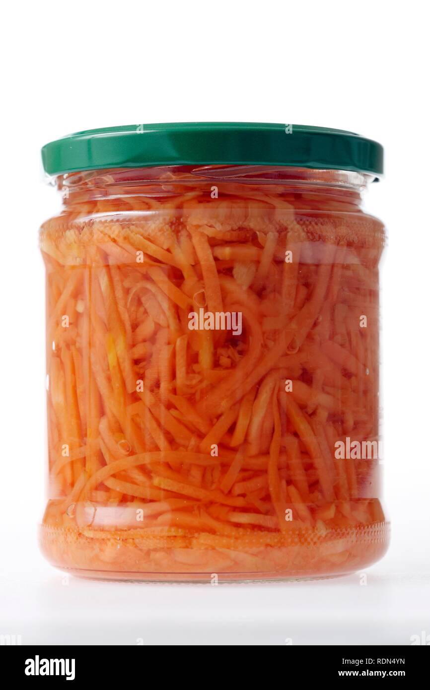 Carrots Julienne conserved in glass packaging Stock Photo