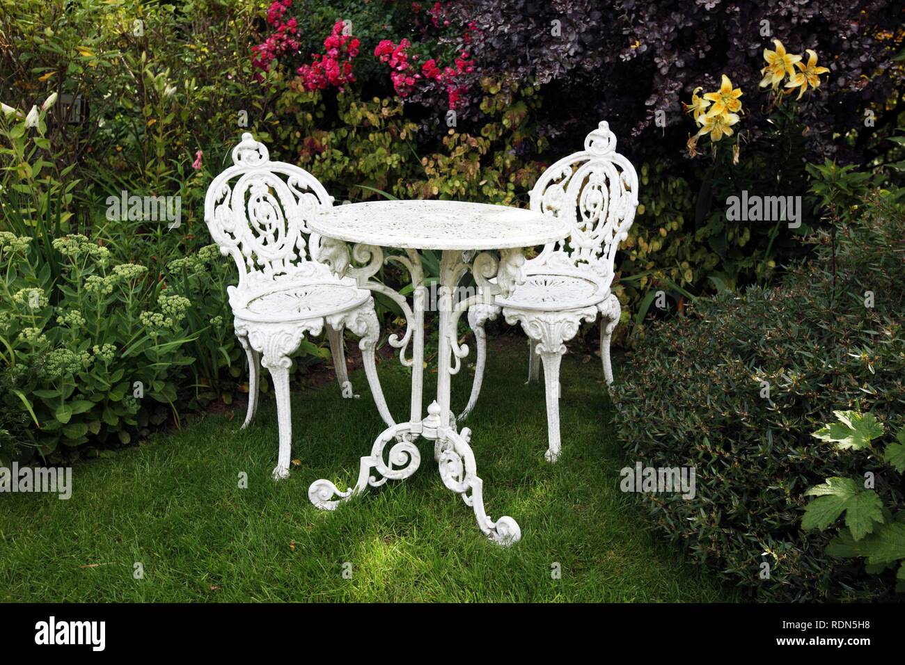 Seating group, holiday cottages, Mille Fleurs Garden, garden landscape, St. Peter's, Guernsey, Channel Islands, Europe Stock Photo