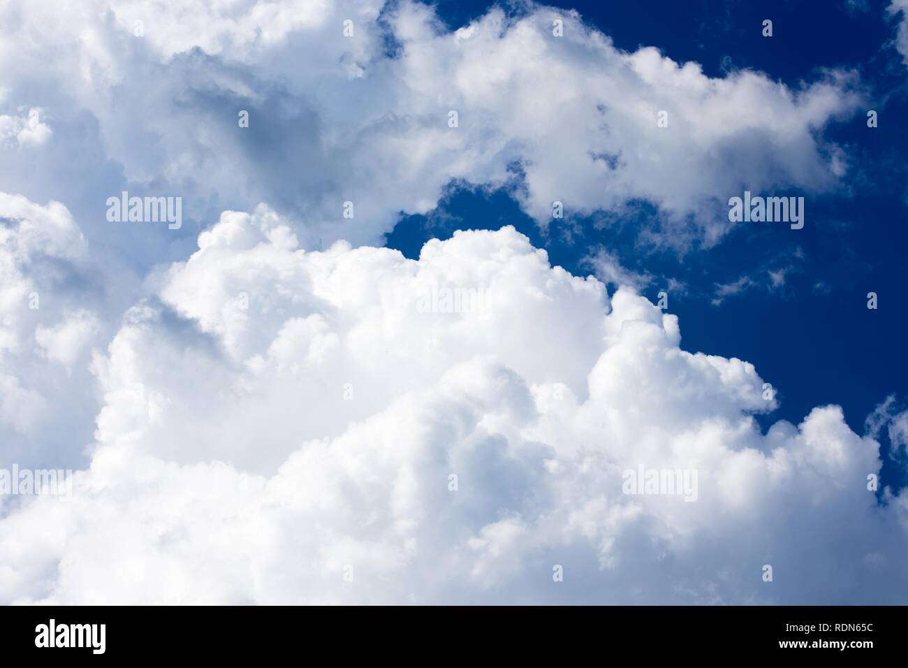 big white clouds on a blue sky Stock Photo - Alamy